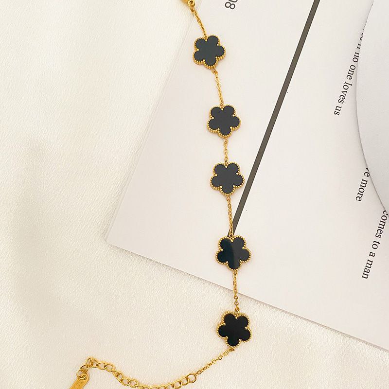 Rose necklace set in distinctive black and white colors with elegant flow