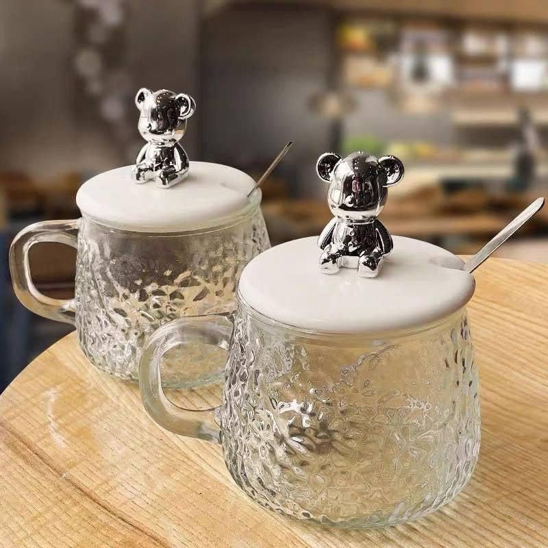 300ml Pyrex thermal mug with teddy bear lid and spoon... Bubbles mug with teddy bear lid, suitable for milk, juice, chocolate, mocha, cappuccino, tea, and water
