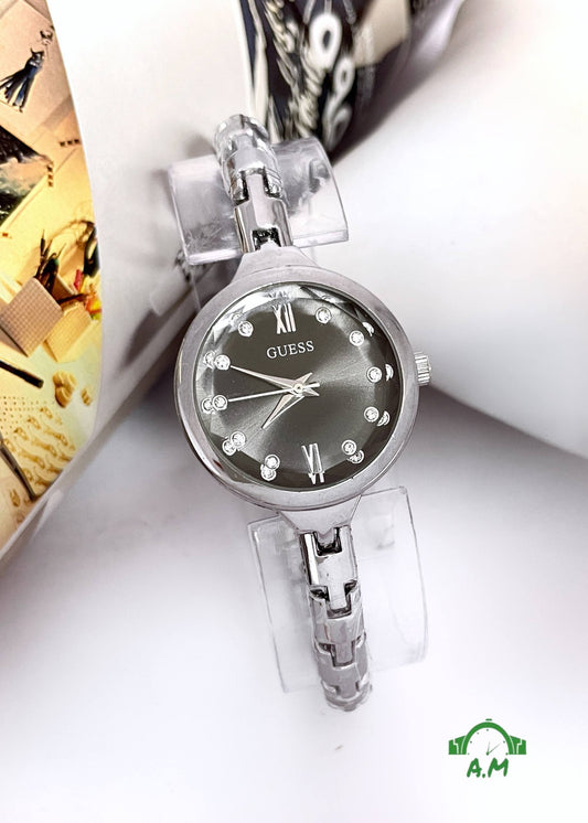 ستانلس ستيل متين وراقي - Guess – ساعه انسيال متعدد الالوان