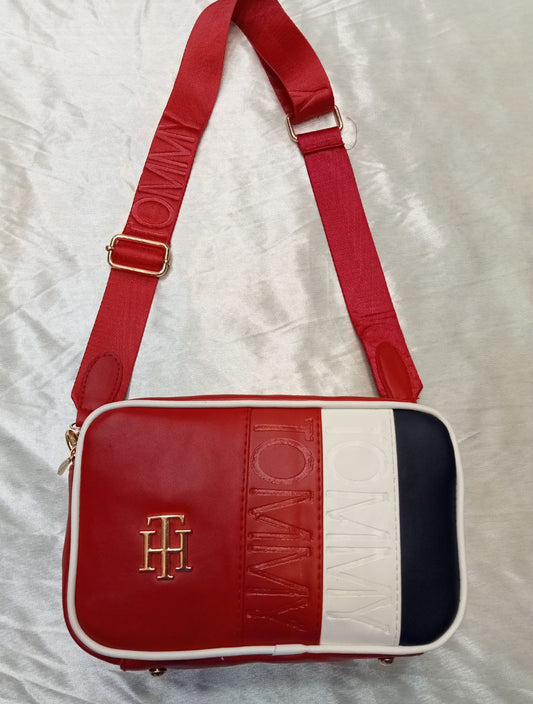 شنطه تومي متعدده الألوان – مقاس 25*20