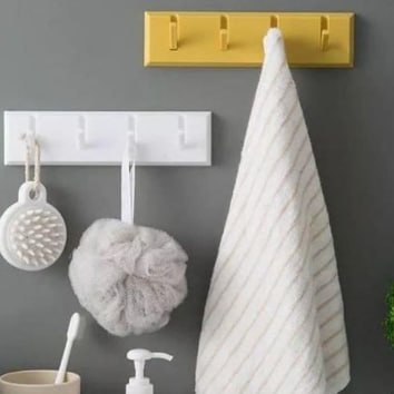 Multi-purpose wall hanger with weight capacity in different colors - modern and elegant design for perfect organization!