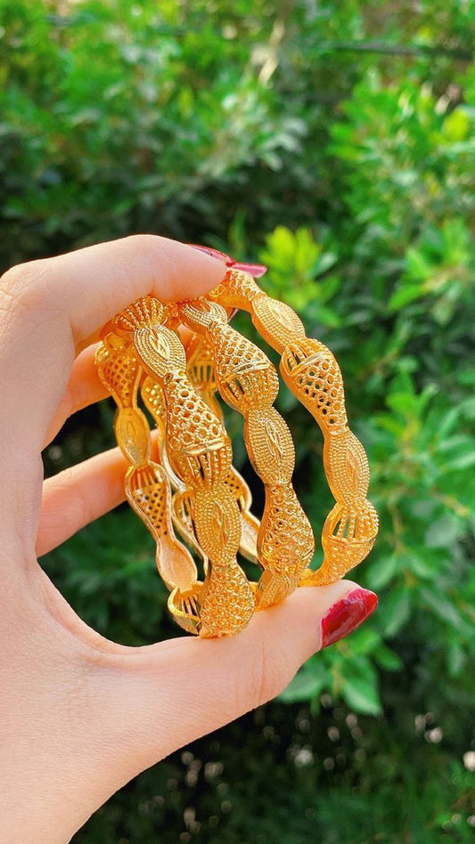 Traditional Saudi heritage bracelets plated with gold, with a wonderful design, consisting of (4 pieces) - a golden touch that completes your elegance